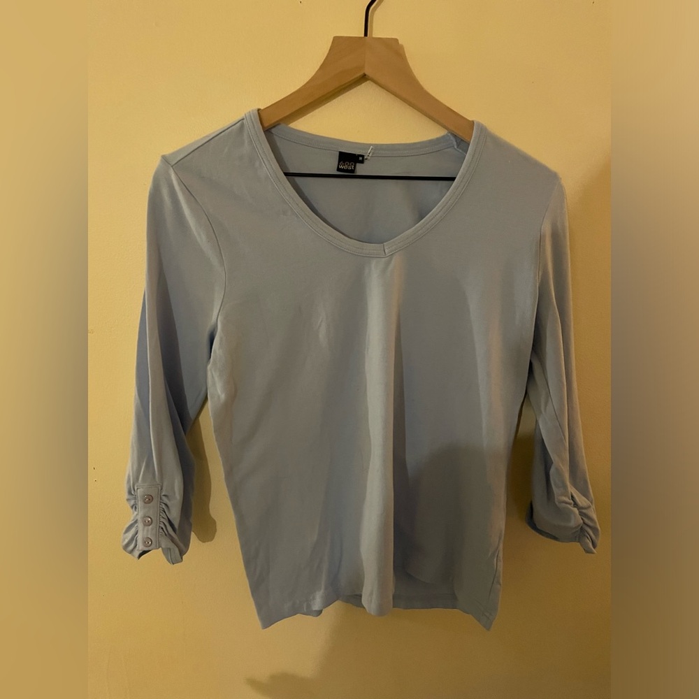 600 West light blue T size medium